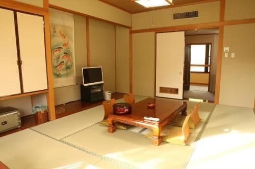 Japanese-Style Family Room with Shared Bathroom