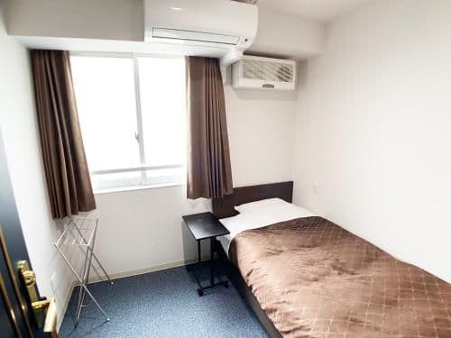 Single Room with Shared Shower and Toilet