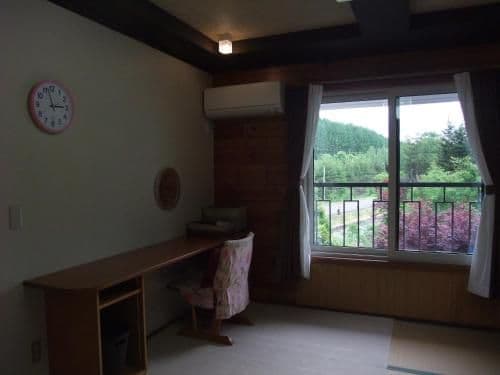 Japanese-Style Family Room with Shared Bathroom