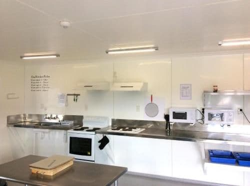 Powered Site with Shared Bathroom - No Bed Provided