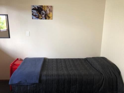Single Bed in Dormitory Room