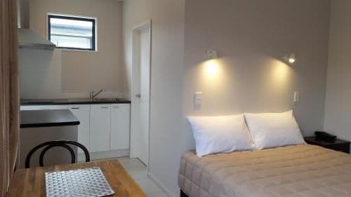 Queen Studio with Bath (3 Adults)