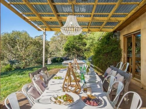 The Farmhouse - grape vines and rolling green hills3