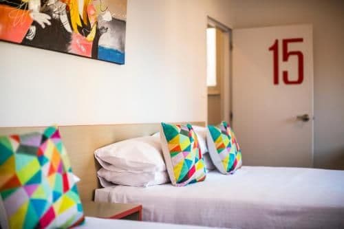 Economy Twin Queen with Shared Facilities and Free Welcome Drink For Two Guests