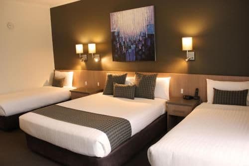 Deluxe Queen Room with One Queen and Two Single Beds