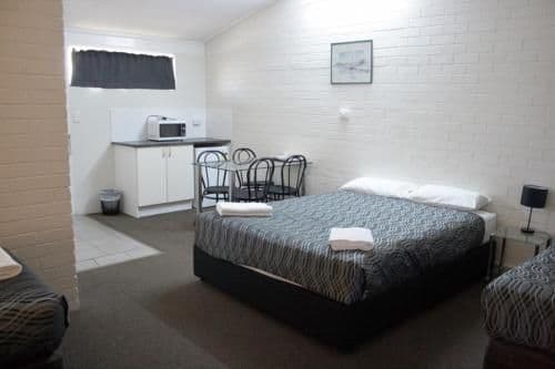Family Room with 1 Queen and 3 Single Beds