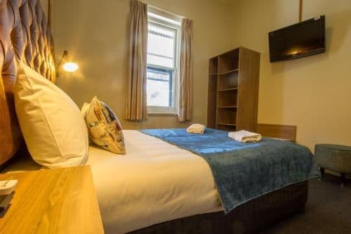 Queen Room with Shared Bathroom