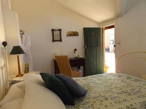 Double Room with Patio and Shared Bathroom