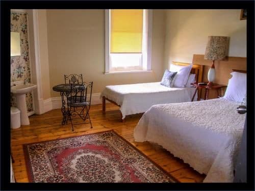 Budget Double Room + Single with Shared Bathroom
