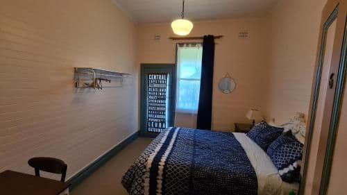 Queen Room with Shared Bathroom