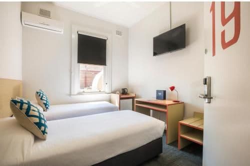 Economy Twin Room with Shared Bathroom and Free Welcome Drink For Two Guests