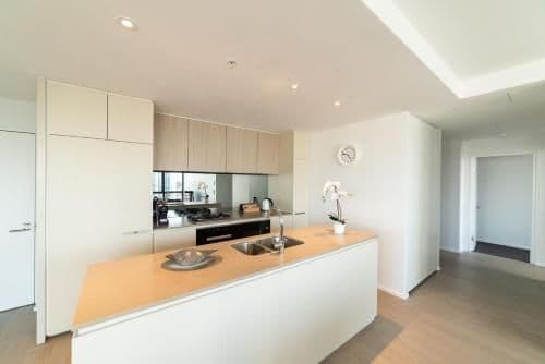 Top Floor Sub Penthouse, Three Bedroom, Two-Bathroom with City & Sea Views