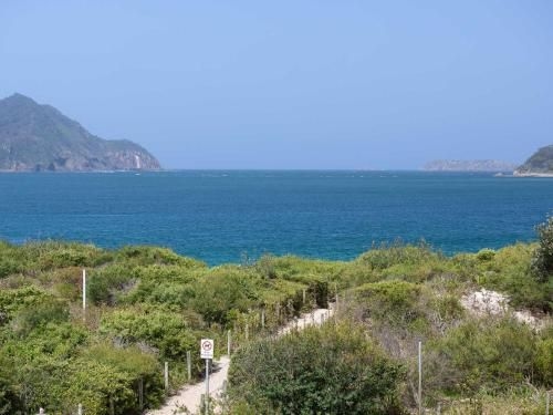 10 'Intrepid' 3 Intrepid Close - water views over Shoal Bay Beach0