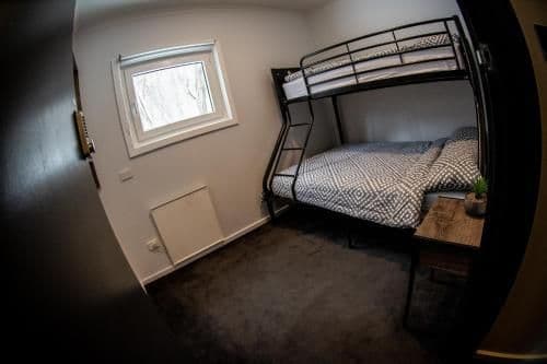 Small Family Room with Shared Bathroom
