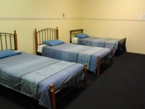 Single Bed in Dormitory Room