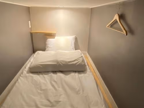 Single Bed in Female Dormitory Room