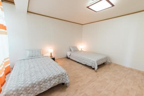 Single Bed in Dormitory Room