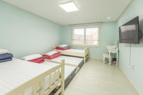 Quadruple Room with Private Bathroom