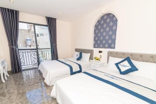 Deluxe Quadruple Room with Balcony