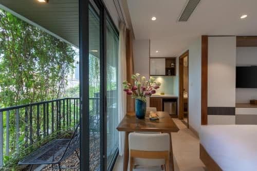 Family Room with Balcony - Street and Pool View