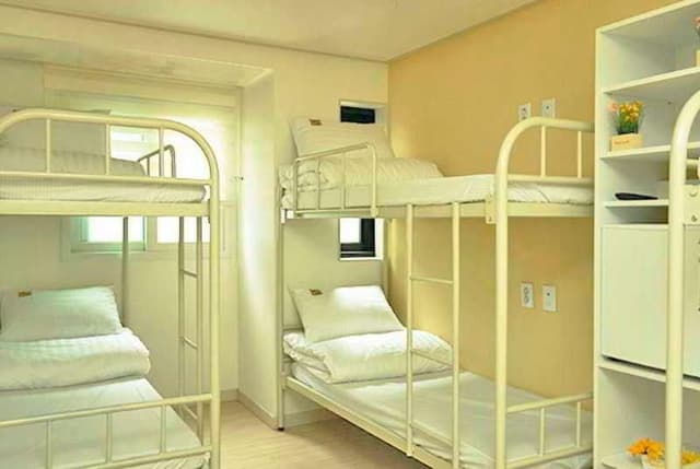 Bed in dormitory FEMALE ROOM CAPACITY 8