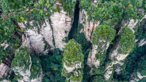 ทัวร์หนึ่งวันไปยังถ้ำ Huanglong และจุดชมวิวจางเจียเจี้ยแกรนด์แคนยอน รวมถึงสะพานกระจกแกรนด์แคนยอน