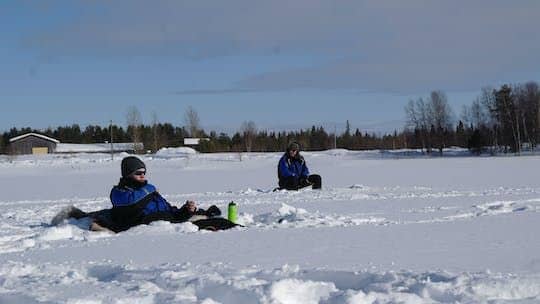 Ice fishing trip from Levi to Kivijärvi by snowmobile
