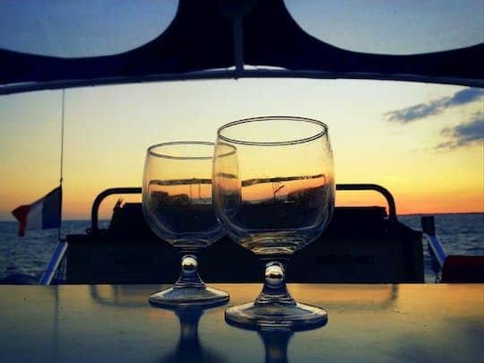 Sailing cruise on a Catamaran at aperitif time from La Rochelle