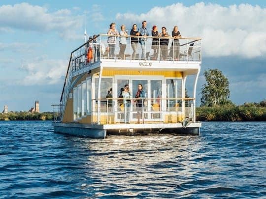 Boat cruise on Peene river with coffee and cake