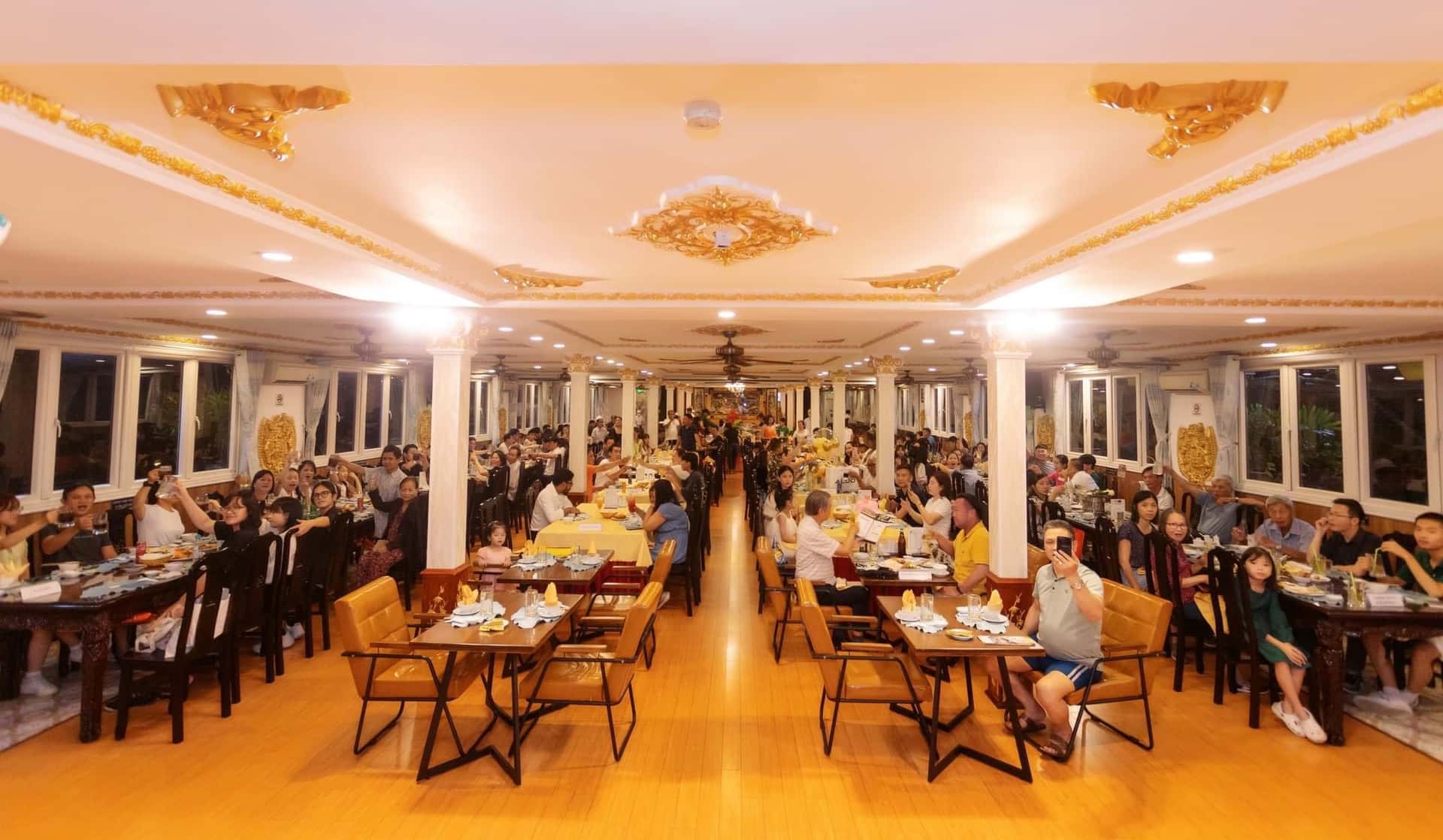 Saigon Evening Tour with WaterBus & Dinner Cruise by Motorbike4